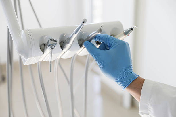 Professional Emergency Dentist technician working in Birmingham, MI